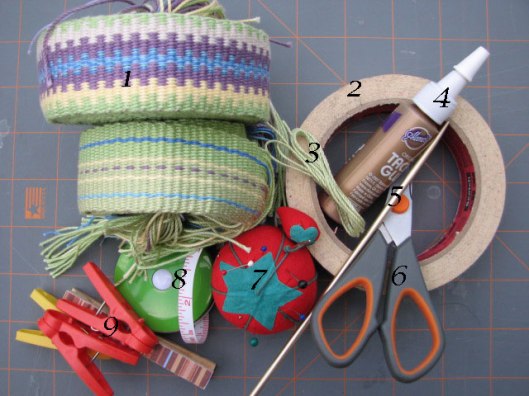 1. Inkle band(s) 2. masking tape 3. extra yarn, floss, or thread 4. all purpose glue 5. knitting needle (optional) 6. scissors 7. straight pins and embroidery needle 8. something to measure with 9. clothes pins